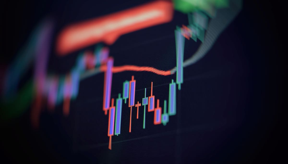 Crypto-parel trotseert de bitcoin-dip en verdubbelde vannacht in waarde Een afbeelding van een candle chart met verschillende kleuren en marktdata over de desbetreffende crypto of aandeel