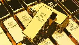 Goud Gouden baren die schuin op elkaar liggen, met de opdruk ''999,9 Fine Gold''