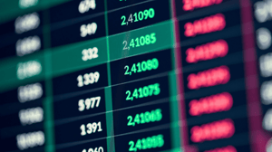 Een afbeelding van rode en groene cijfers van crypto marktdata Een afbeelding van rode en groene cijfers van crypto marktdata