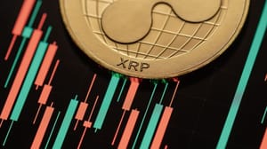 Foto van XRP munt op een koersgrafiek
