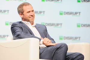 mansittinginchairxrp Garlinhouse speaking on crypto in america
