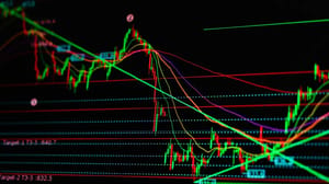 Een afbeelding van een volatiele koers met een hele reeks aan technische indicatoren van de prijs van het aandeel of de crypto Een afbeelding van een volatiele koers met een hele reeks aan technische indicatoren van de prijs van het aandeel of de crypto