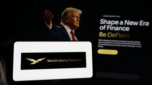 Een afbeelding van het logo en de website van de cryptomunt van de familie Trump Een afbeelding van het logo en de website van de cryptomunt van de familie Trump
