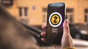 Een afbeelding van het logo van Zcash op een mobiele telefoon Een afbeelding van het logo van Zcash op een mobiele telefoon