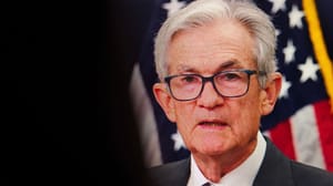 Een afbeelding van Jerome Powell met een Amerikaanse vlag op de achtergrond Een afbeelding van Jerome Powell met een Amerikaanse vlag op de achtergrond