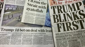 Een afbeelding van krantenkoppen over een deal tussen Iran en Trump Een afbeelding van krantenkoppen over een deal tussen Iran en Trump