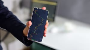 grafiek-telefoon Miljoenen euro's in bitcoin ingezet op Oranje als wereldkampioen