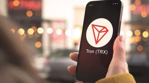 Tron, Trx, Cryptocurrency, Symbol, , Logo., Business, And, Financial, Concept., Hand Nieuw beursfonds investeert in Tron maar levert ook rendement op