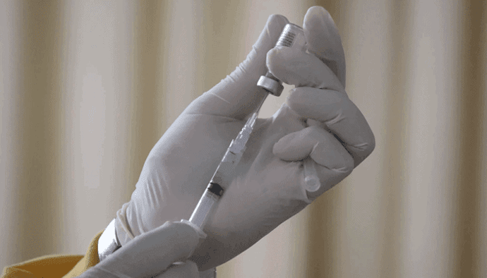 Bitcoin (BTC) als beloning voor COVID-19 vaccinatie Miljonair in Australië gaat het regelen