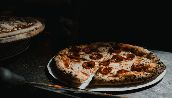 Vandaag is het Bitcoin (BTC) Pizza Day De dag waarop deze man voor 10.000 BTC een pizza kocht