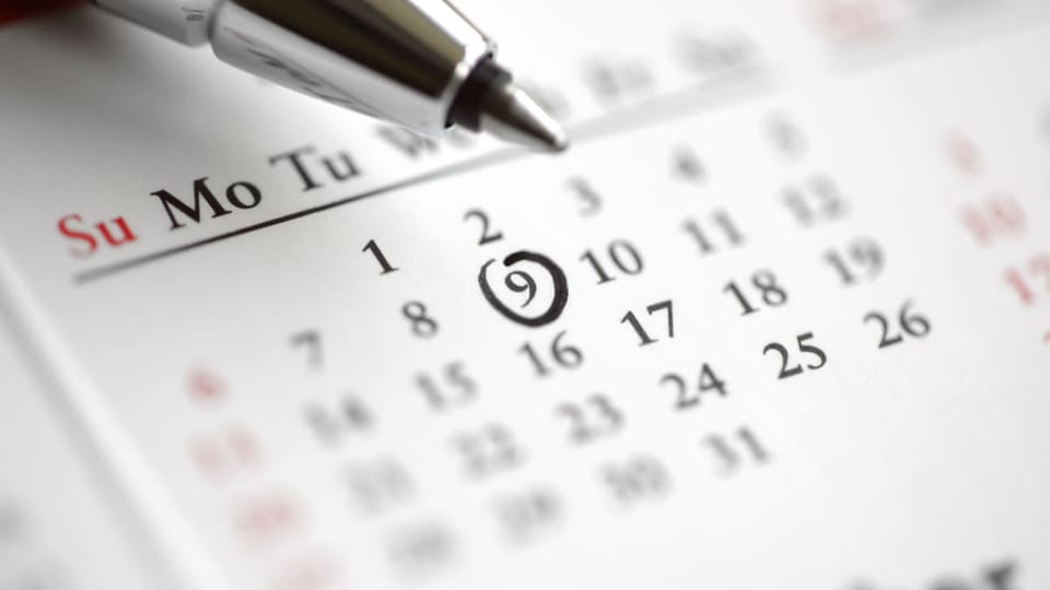 Een afbeelding van een omcirkelde datum op een kalender, voor een belangrijk evenement