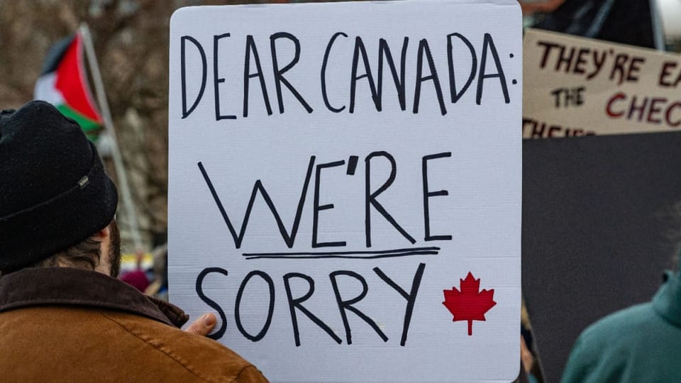 Een afbeelding van een protest tegen de wereldwijde handelsoorlog van Donald Trump
