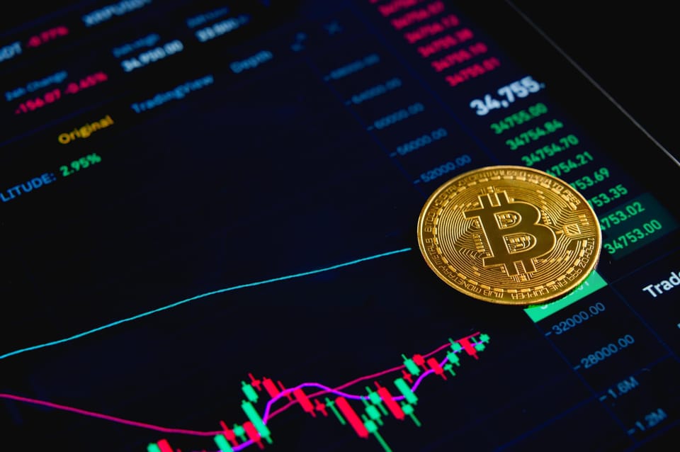 Bitcoin,Gold,Coin,On,Screen,With,Stock,Graph.,Cryptocurrency.,Bitcoin